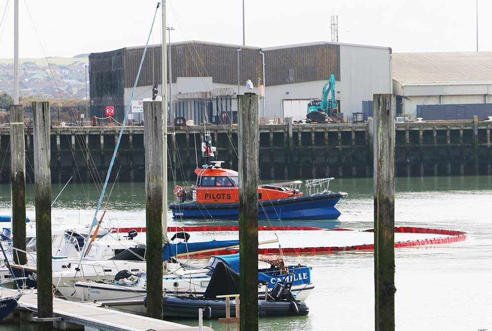 The Seaaxe, Newhaven pilot boat on an oil spill exercise in Newhaven Port and marina area