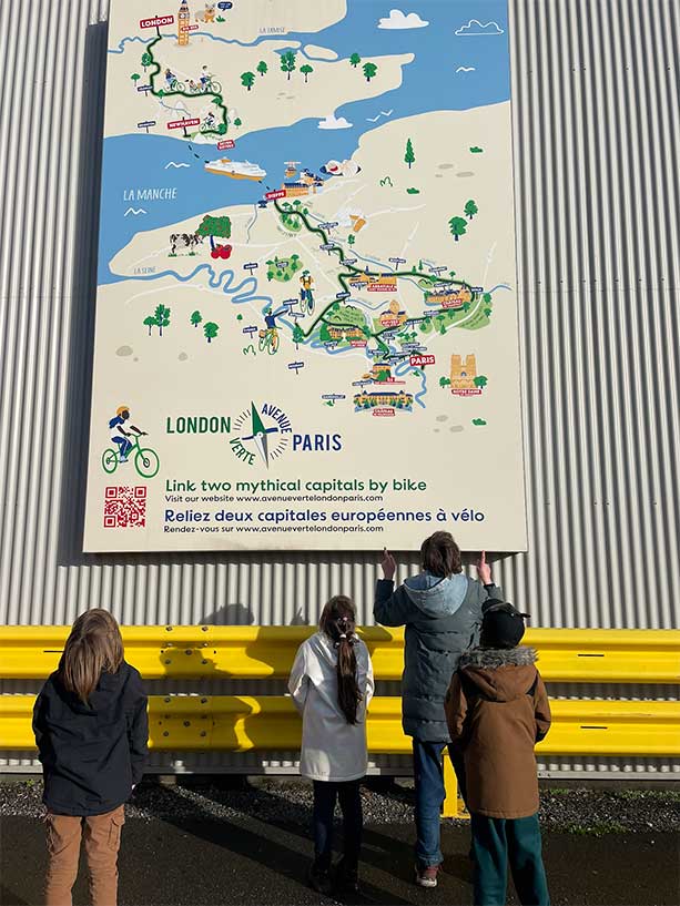 Family looks at the Avenue Verte map at Newhaven Port