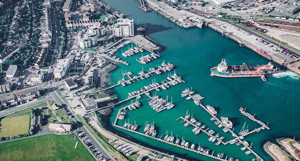 About us aerial view of port with users