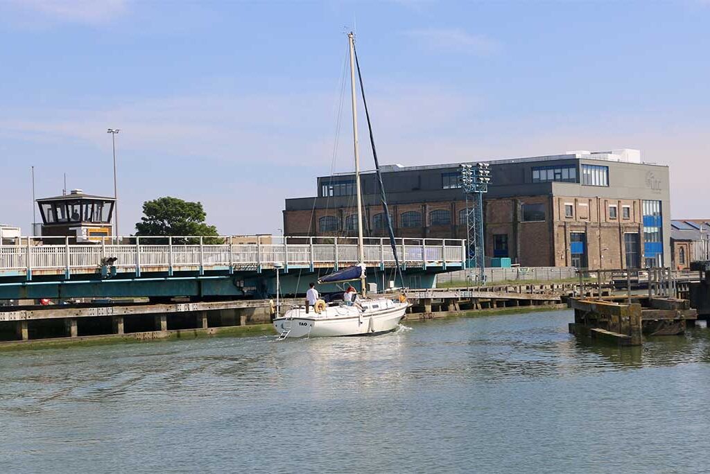 Newhaven Port Swing Bridge with a boat on sea