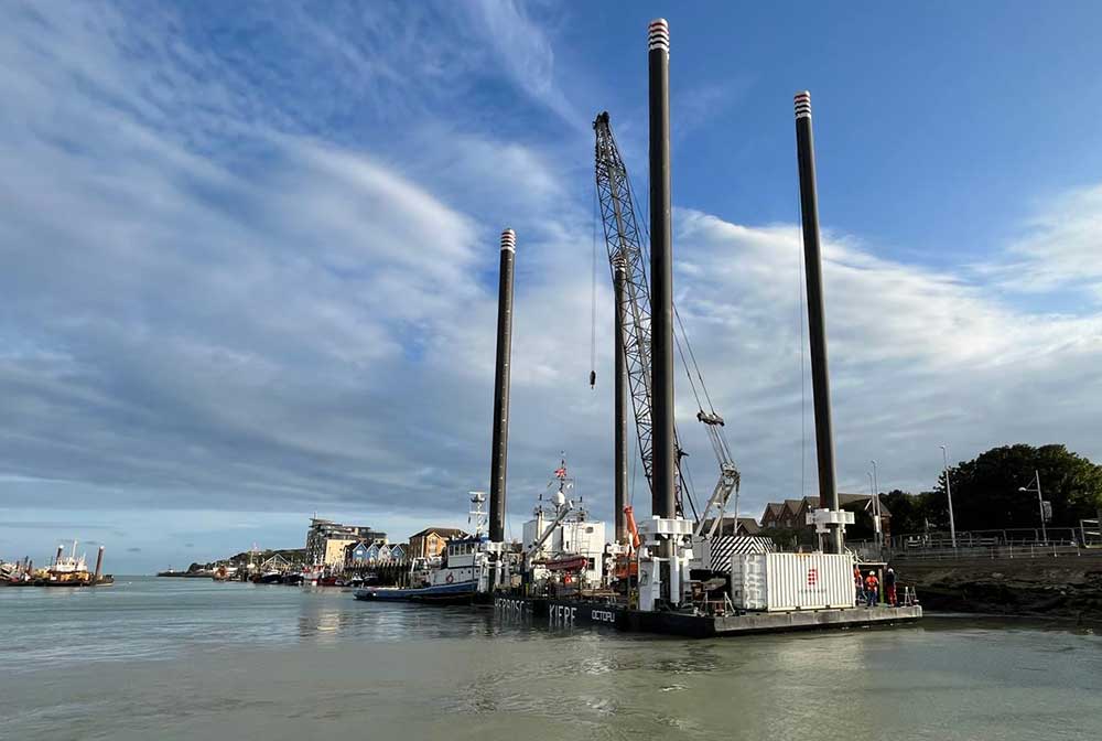 Octopus platform and rig in position alongside old fishing stages in Newhaven Port