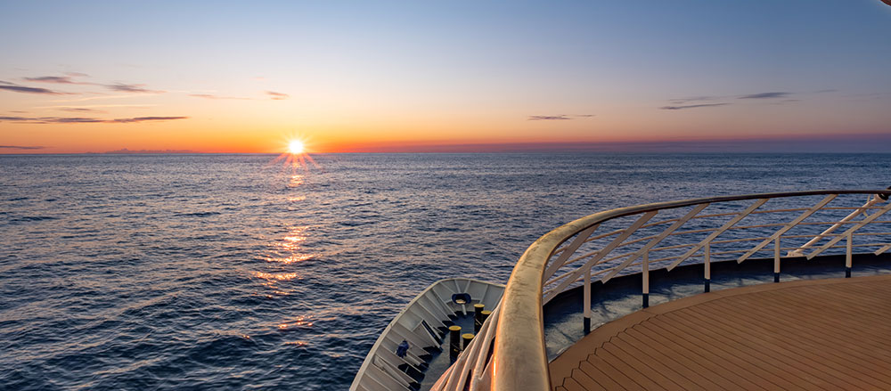 bow of cruise ship in the sunset