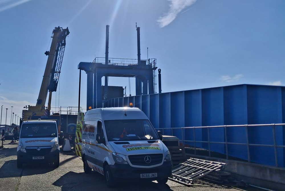 Newhaven Port linkspan with maintenance vans and crane